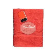 Carica l'immagine nel visualizzatore di Gallery, a red cell phone sitting on top of a red bag