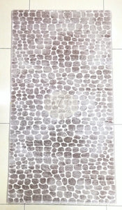 a black and white photo of a tiled wall 